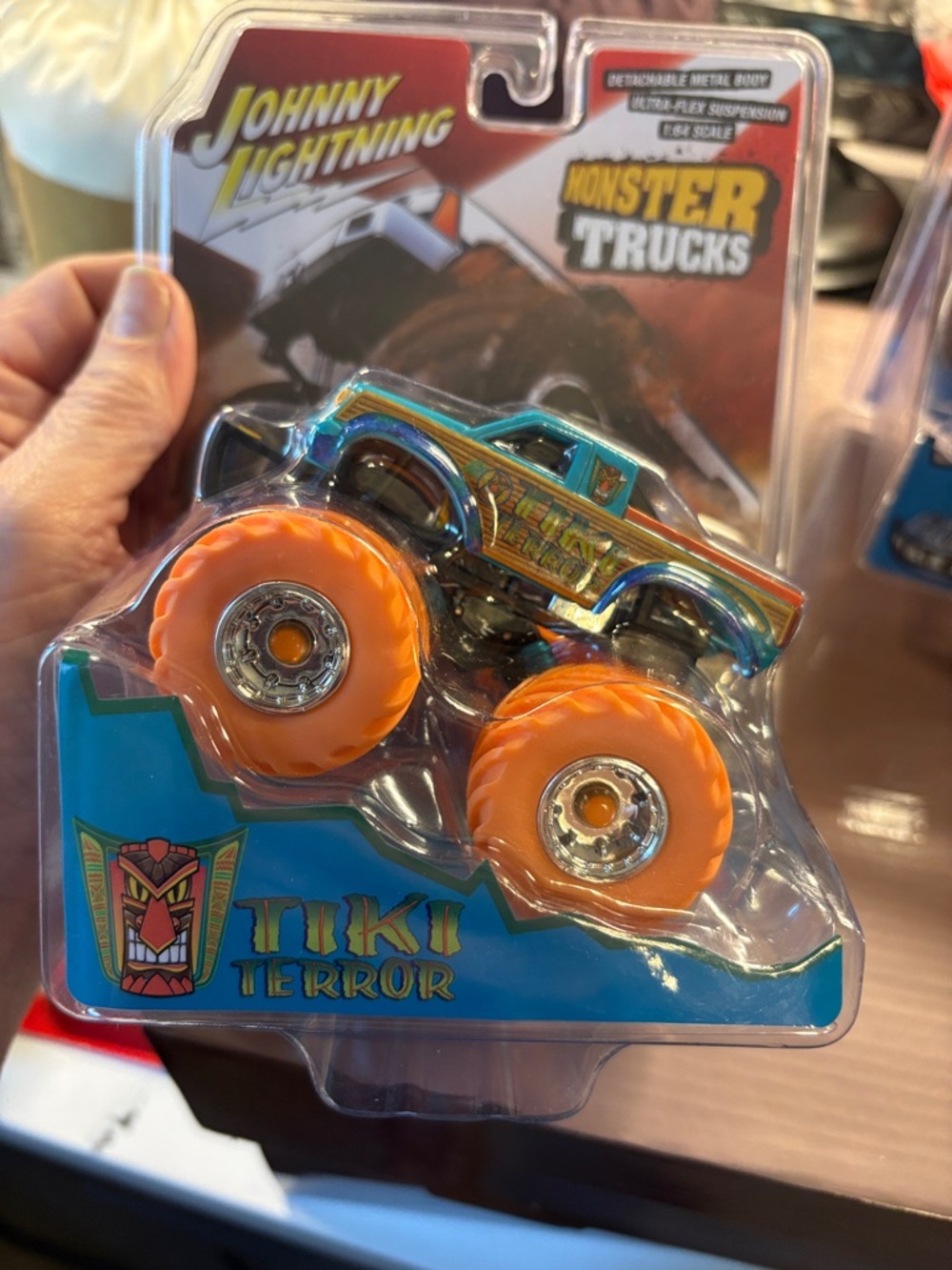 Johnny Lightning Tiki Terror Monster Truck - Teal & Gold with Orange Wheels